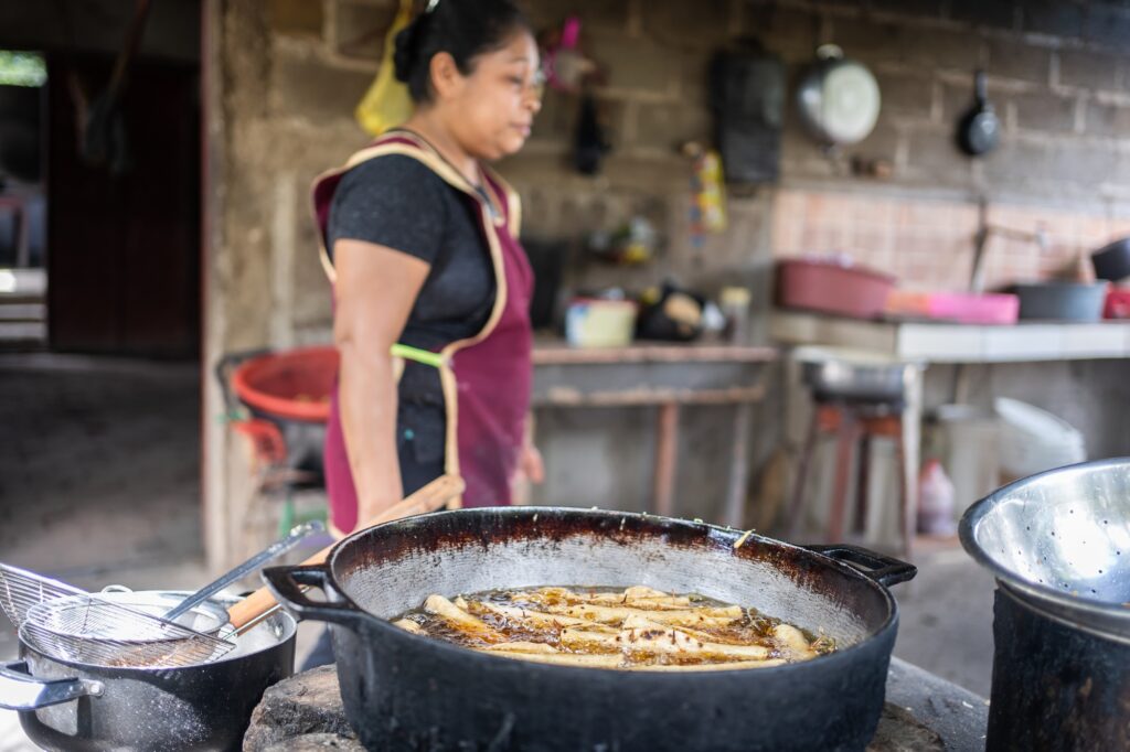 Pan with food in a domestic poor kitchen